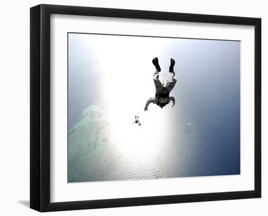 U.S. Air Force Pararescuemen Conducting a Pararescue Training Jump from an Hc-130 Hercules-null-Framed Photographic Print