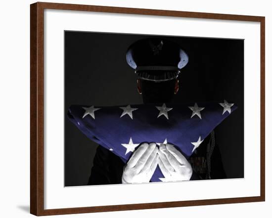 U.S. Airman Stands at Attention After Completing the Flag Dressing Sequence-Stocktrek Images-Framed Photographic Print