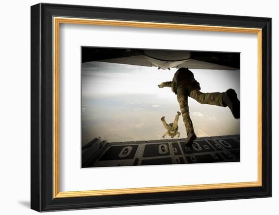 U.S. Army Green Berets Jump Out of a C-130H3 Hercules over Florida-Stocktrek Images-Framed Photographic Print