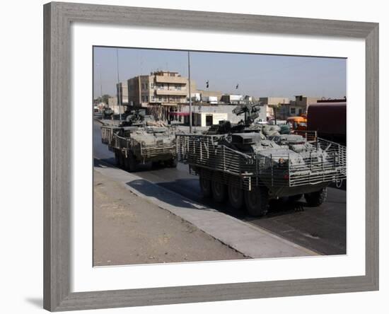 U.S. Army Soldiers Patrolling in Stryker Armored Wheeled Vehicles as Part of Operation Block Party-null-Framed Photographic Print
