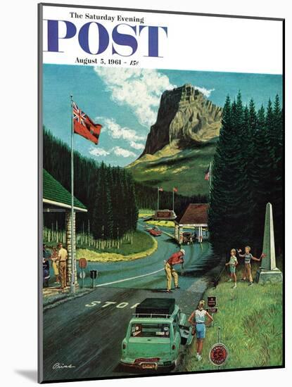 "U.S./Canadian Border at Waterton-Glacier," Saturday Evening Post Cover, August 5, 1961-Ben Kimberly Prins-Mounted Giclee Print