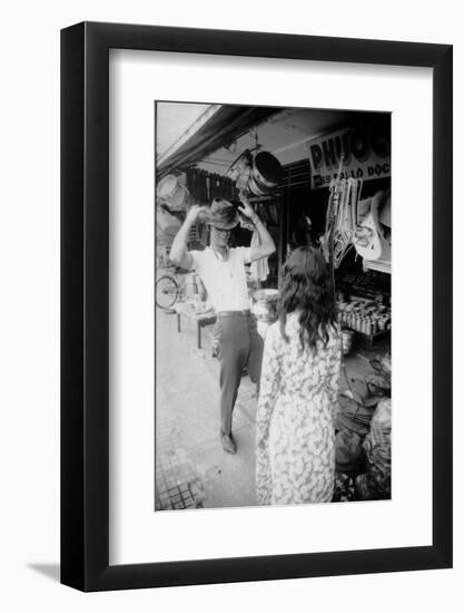 U.S Cpl. James C. Farley of Yankee Papa 13 Trying on Bush Hats, Danang, Vietnam 1965-Larry Burrows-Framed Photographic Print