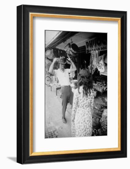 U.S Cpl. James C. Farley of Yankee Papa 13 Trying on Bush Hats, Danang, Vietnam 1965-Larry Burrows-Framed Photographic Print