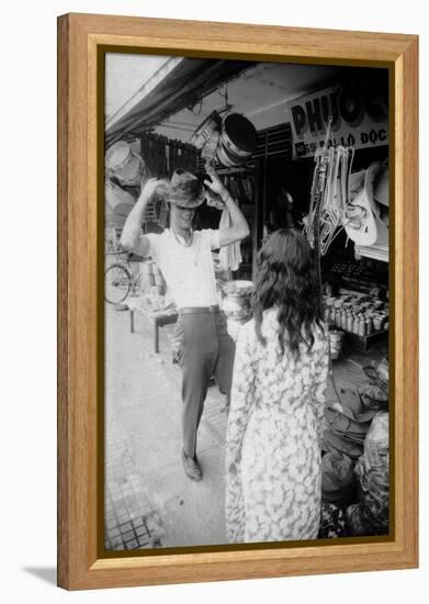 U.S Cpl. James C. Farley of Yankee Papa 13 Trying on Bush Hats, Danang, Vietnam 1965-Larry Burrows-Framed Premier Image Canvas