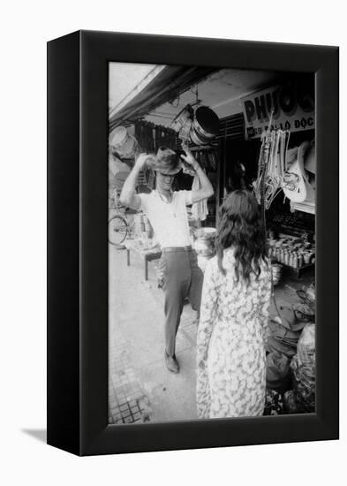 U.S Cpl. James C. Farley of Yankee Papa 13 Trying on Bush Hats, Danang, Vietnam 1965-Larry Burrows-Framed Premier Image Canvas