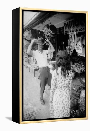 U.S Cpl. James C. Farley of Yankee Papa 13 Trying on Bush Hats, Danang, Vietnam 1965-Larry Burrows-Framed Premier Image Canvas