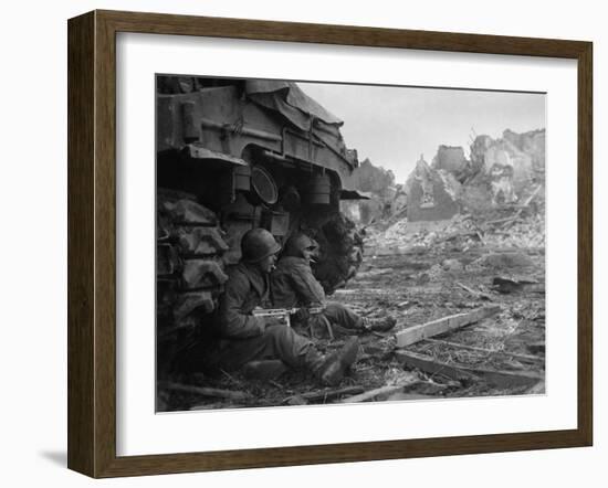 U.S. Infantrymen Sheltering Behind a M-4 Sherman Tank During Heavy German Shelling-null-Framed Photo