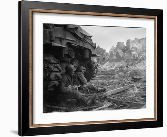 U.S. Infantrymen Sheltering Behind a M-4 Sherman Tank During Heavy German Shelling-null-Framed Photo