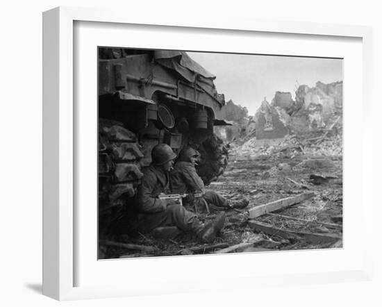 U.S. Infantrymen Sheltering Behind a M-4 Sherman Tank During Heavy German Shelling-null-Framed Photo