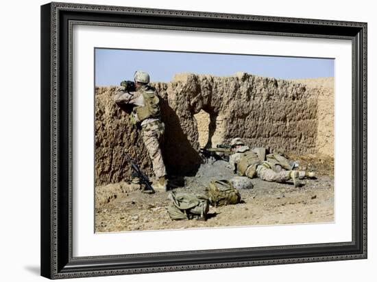 U.S. Marines Take Cover During a Patrol in Afghanistan-null-Framed Photographic Print