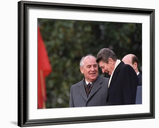 U.S. President Ronald Reagan, Right, Talks with Soviet Leader Mikhail Gorbachev-null-Framed Photographic Print