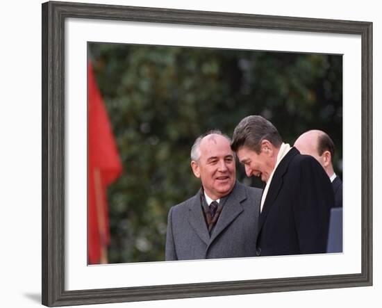 U.S. President Ronald Reagan, Right, Talks with Soviet Leader Mikhail Gorbachev-null-Framed Photographic Print