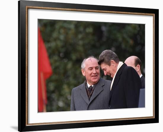 U.S. President Ronald Reagan, Right, Talks with Soviet Leader Mikhail Gorbachev-null-Framed Photographic Print