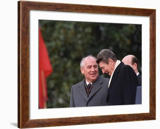 U.S. President Ronald Reagan, Right, Talks with Soviet Leader Mikhail Gorbachev-null-Framed Photographic Print