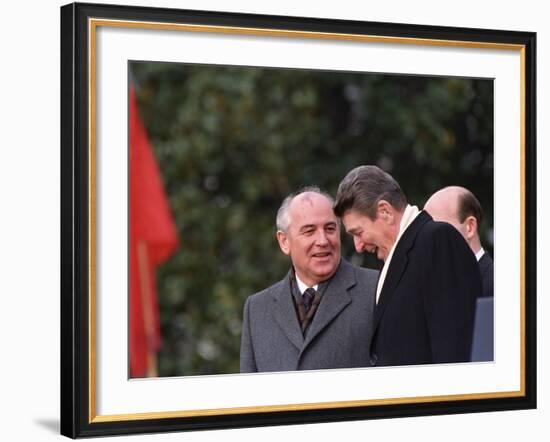 U.S. President Ronald Reagan, Right, Talks with Soviet Leader Mikhail Gorbachev--Framed Photographic Print