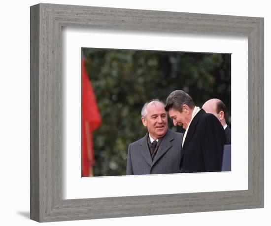 U.S. President Ronald Reagan, Right, Talks with Soviet Leader Mikhail Gorbachev-null-Framed Photographic Print