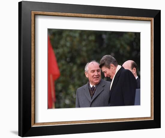 U.S. President Ronald Reagan, Right, Talks with Soviet Leader Mikhail Gorbachev-null-Framed Photographic Print