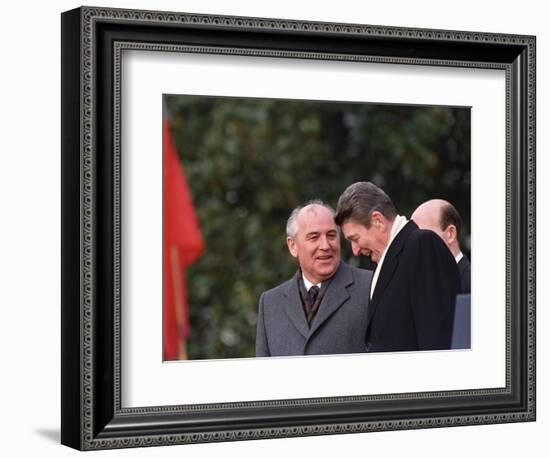 U.S. President Ronald Reagan, Right, Talks with Soviet Leader Mikhail Gorbachev-null-Framed Photographic Print