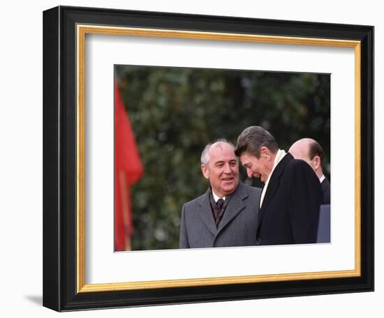 U.S. President Ronald Reagan, Right, Talks with Soviet Leader Mikhail Gorbachev-null-Framed Photographic Print