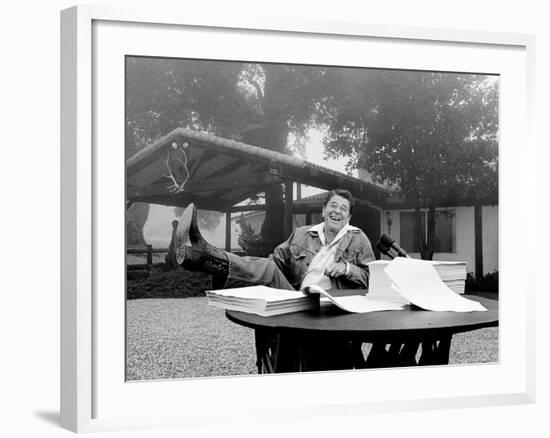 U.S. President Ronald Reagan Shows His Boot Following the Signing of His Tax Bill-null-Framed Photographic Print