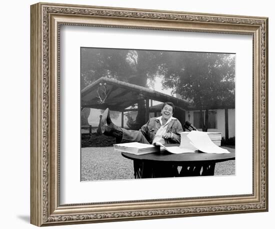 U.S. President Ronald Reagan Shows His Boot Following the Signing of His Tax Bill-null-Framed Photographic Print