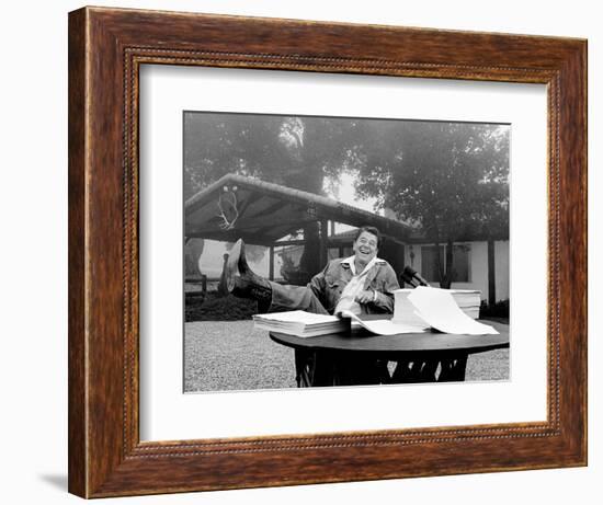 U.S. President Ronald Reagan Shows His Boot Following the Signing of His Tax Bill-null-Framed Photographic Print