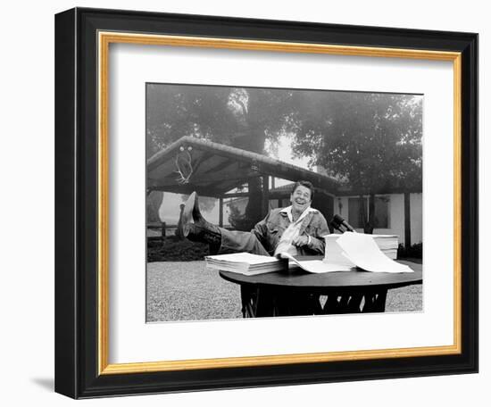 U.S. President Ronald Reagan Shows His Boot Following the Signing of His Tax Bill-null-Framed Photographic Print