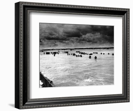 U.S. Reinforcements Wade Through the Surf as They Land at Normandy-null-Framed Photographic Print
