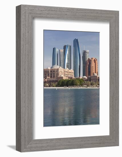 UAE, Abu Dhabi. Downtown waterfront skyscrapers.-Walter Bibikow-Framed Photographic Print