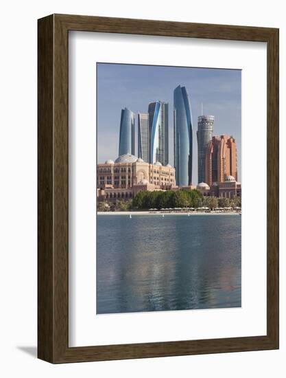 UAE, Abu Dhabi. Downtown waterfront skyscrapers.-Walter Bibikow-Framed Photographic Print