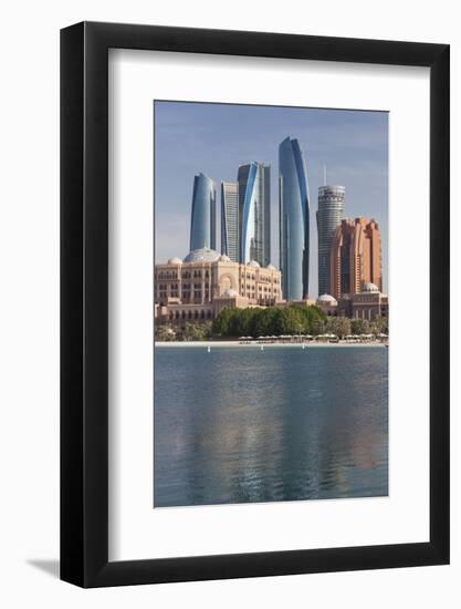 UAE, Abu Dhabi. Downtown waterfront skyscrapers.-Walter Bibikow-Framed Photographic Print