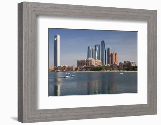 UAE, Abu Dhabi. Downtown waterfront skyscrapers.-Walter Bibikow-Framed Photographic Print