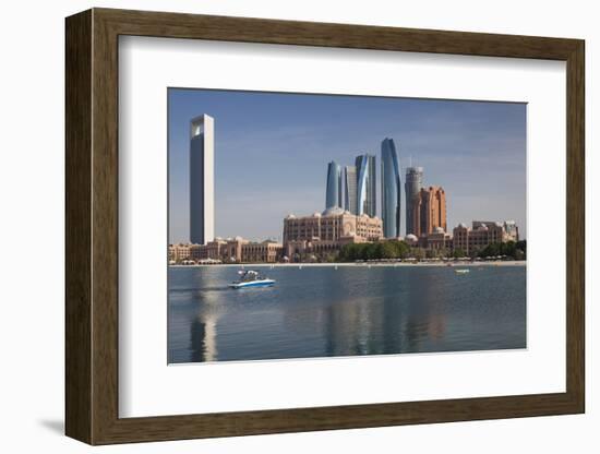 UAE, Abu Dhabi. Downtown waterfront skyscrapers.-Walter Bibikow-Framed Photographic Print