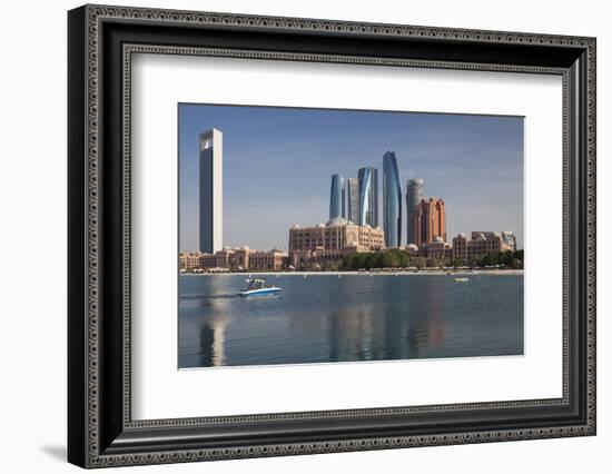 UAE, Abu Dhabi. Downtown waterfront skyscrapers.-Walter Bibikow-Framed Photographic Print