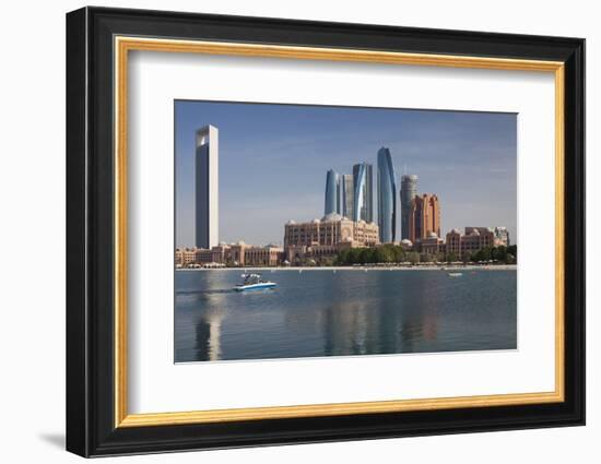 UAE, Abu Dhabi. Downtown waterfront skyscrapers.-Walter Bibikow-Framed Photographic Print