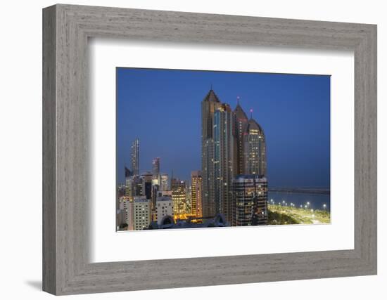 UAE, Abu Dhabi. Elevated skyline from Corniche Road East-Walter Bibikow-Framed Photographic Print