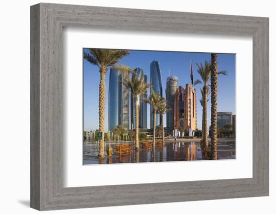 UAE, Abu Dhabi. Palm tree lined fountain in downtown.-Walter Bibikow-Framed Photographic Print