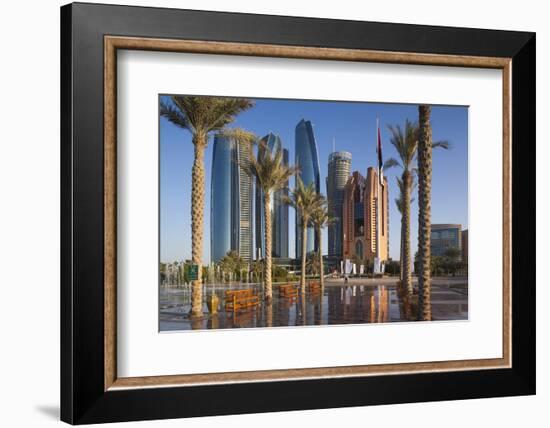 UAE, Abu Dhabi. Palm tree lined fountain in downtown.-Walter Bibikow-Framed Photographic Print