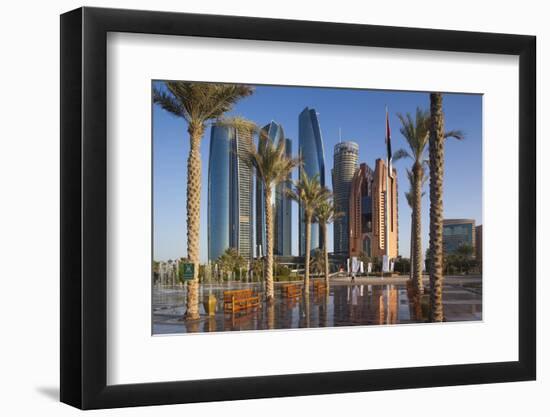 UAE, Abu Dhabi. Palm tree lined fountain in downtown.-Walter Bibikow-Framed Photographic Print