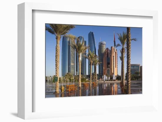 UAE, Abu Dhabi. Palm tree lined fountain in downtown.-Walter Bibikow-Framed Photographic Print