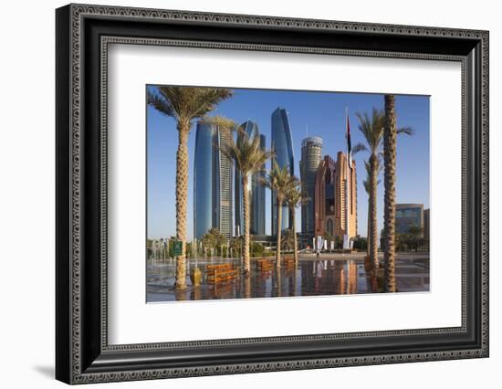 UAE, Abu Dhabi. Palm tree lined fountain in downtown.-Walter Bibikow-Framed Photographic Print