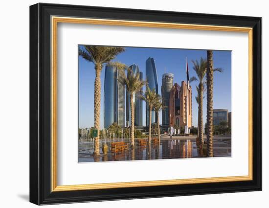 UAE, Abu Dhabi. Palm tree lined fountain in downtown.-Walter Bibikow-Framed Photographic Print