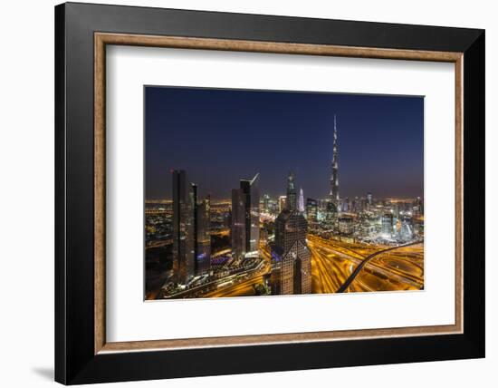 UAE, Downtown Dubai. Cityscape with Burj Khalifa at night.-Walter Bibikow-Framed Photographic Print