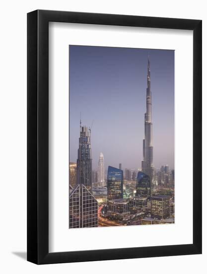 UAE, Downtown Dubai. Cityscape with Burj Khalifa at night.-Walter Bibikow-Framed Photographic Print