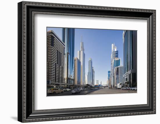 UAE, Downtown Dubai. High-rise buildings along Sheikh Zayed Road-Walter Bibikow-Framed Photographic Print