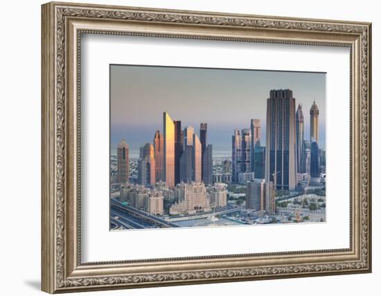 UAE, Downtown Dubai. Skyscrapers on Sheikh Zayed Road from downtown-Walter Bibikow-Framed Photographic Print