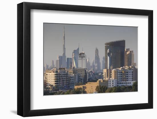 UAE, Dubai, Deira. View of downtown Dubai Skyscrapers from Dubai Creek-Walter Bibikow-Framed Photographic Print