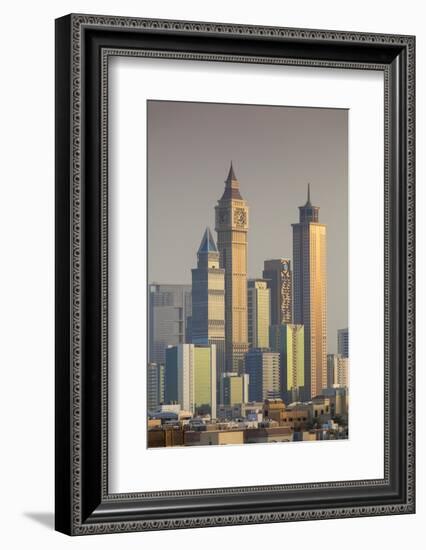 UAE, Dubai, Jumeirah. Skyscrapers seen from Jumeirah-Walter Bibikow-Framed Photographic Print