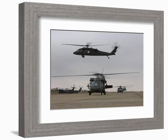 UH-60 Black Hawks Taxis Out for a Mission over Northern Iraq-null-Framed Photographic Print