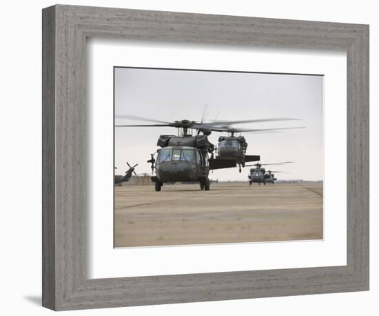 UH-60 Black Hawks Taxis Out for a Mission over Northern Iraq-null-Framed Photographic Print